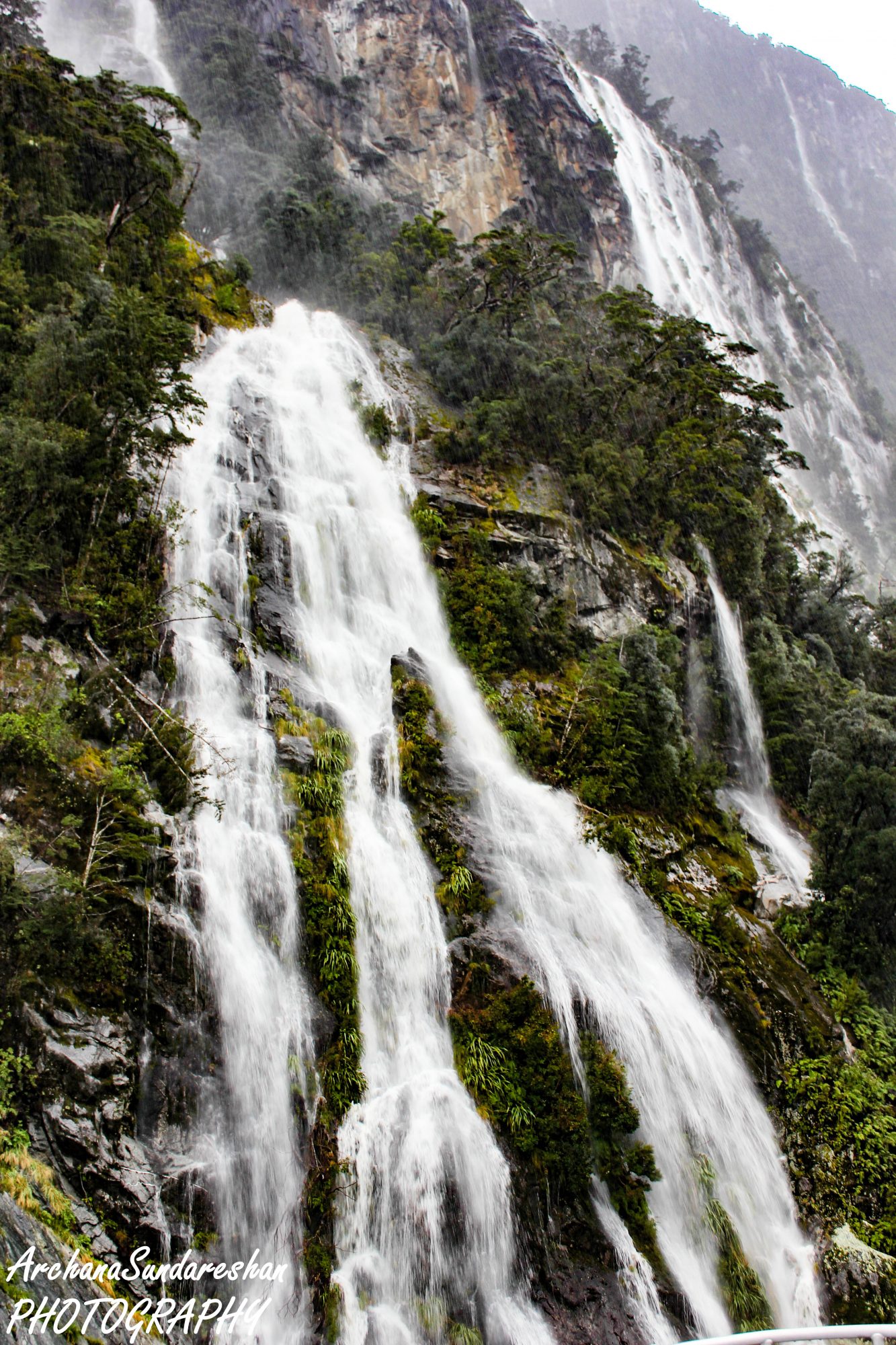 Water falls seen from Milford Sound cruise